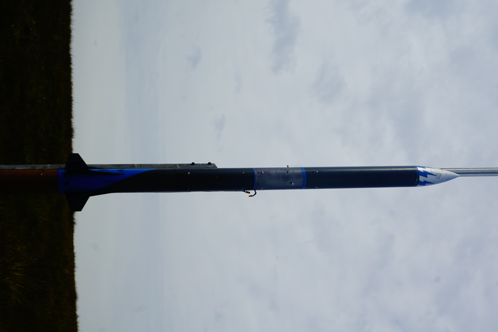 A rocket mounted on the launch rail